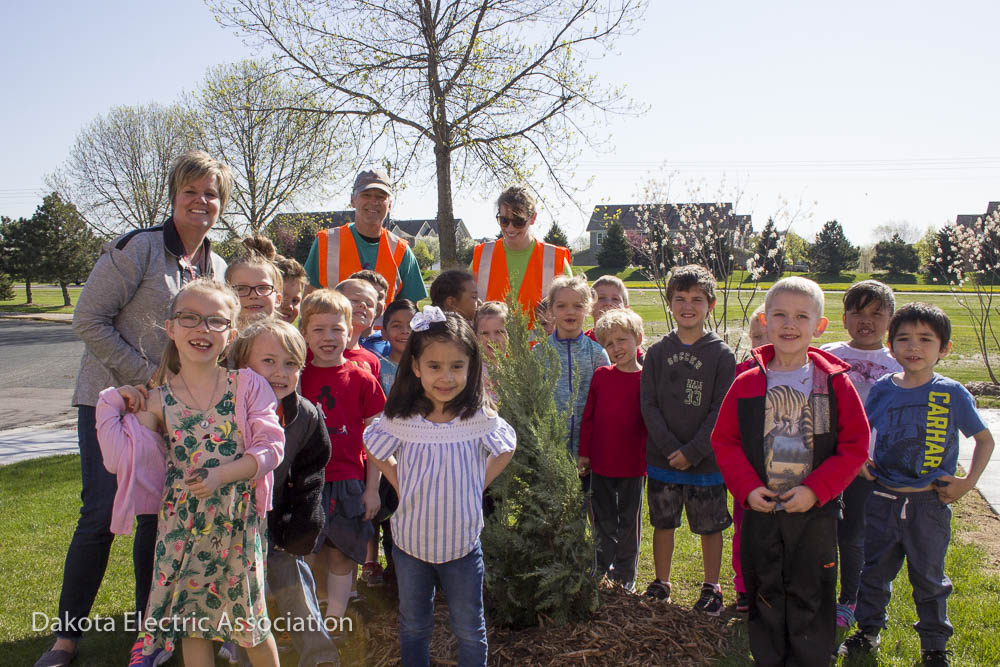 school children planting trees